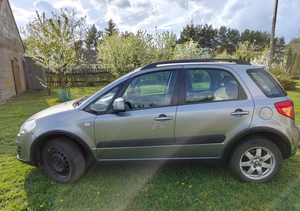 Suzuki SX4 cena 34500 przebieg: 135140, rok produkcji 2013 z Szczecinek małe 211